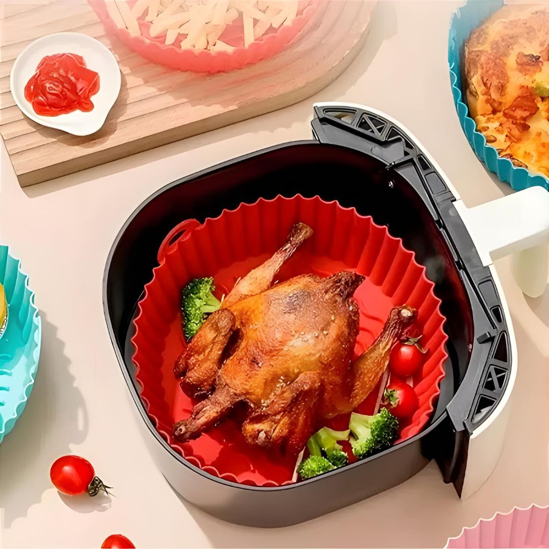 da12268c77785c1e6d1b84b8e36b7e99.jpg Forma de Silicone P/ Air Fryer Redonda 17 Cm - Imagem 1